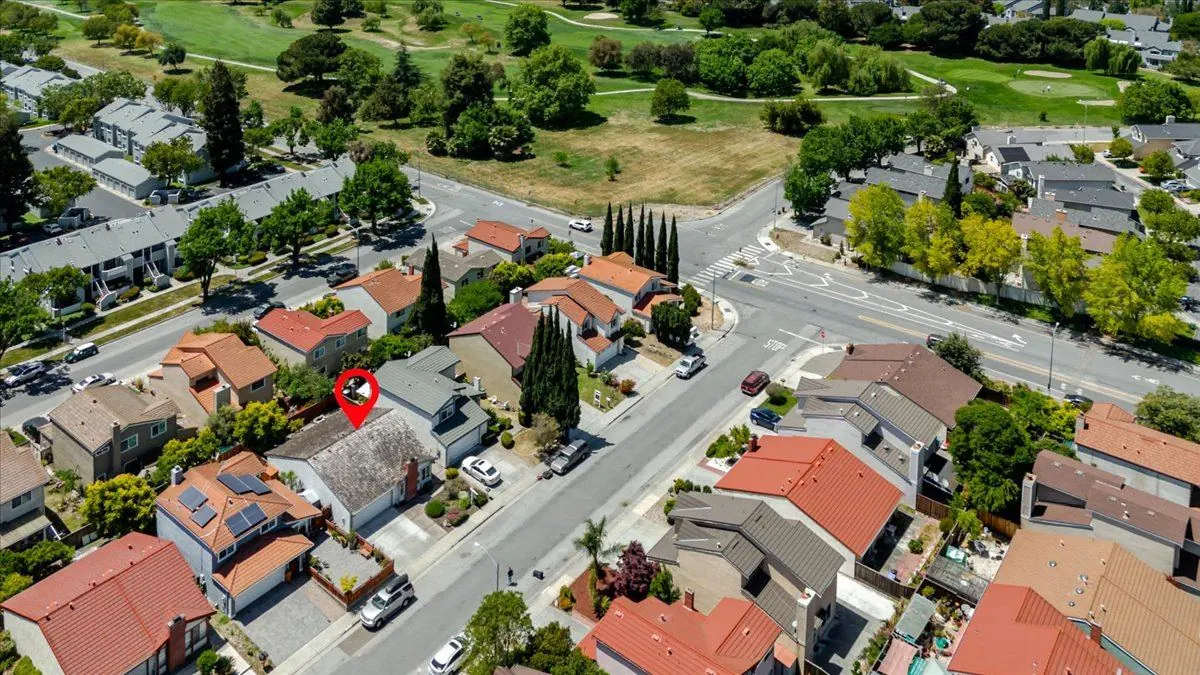 Drone aerial over a golf-course neighborhood